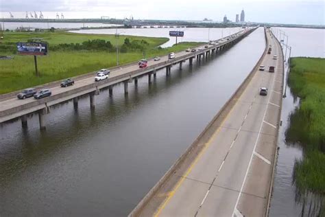 Mobile al traffic - In the summer, I-10 is clogged from Mississippi to Florida, with vacationers visiting the beautiful sugar sand and emerald water beaches along the Gulf Coast, particularly the Florida Panhandle and Orange Beach, Alabama. The I-10 George Wallace tunnel has a huge design flaw—an extremely curved entrance—that slows down traffic …